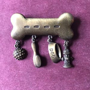 Brass colored dog bone charm pin JJ Jonette